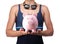 Swimmer holding a piggy bank