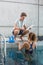 Swimmer talking to her coach poolside