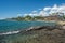 Swimmers in the ocean at Lawai Beach on south coast of Kauai near Poipu