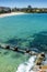 Swimmers and sunbathers enjoying the warm summer weather at the Ross Jones Rockpool