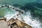 Swimmers and sunbathers enjoying the warm summer weather at the Ross Jones Rockpool