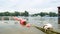 Swimmers train on the lake. Safety buoys in the foreground