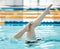 Swimming, athlete and legs in water upside down, exercise and training for healthy body. Pool, feet and person alone in