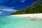 Swimming beach with palm trees on tropical island Rarotonga, Coo