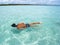 Swimming in crystalline clear sea in Brazil