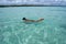 Swimming in crystalline clear sea in Brazil