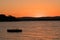 Swimming float and lake in Vermont at sunset