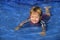 Swimming lessons: Cute baby girl n the pool