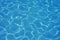 Swimming pool aquatic surface on sun texture background