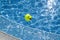 Swimming pool and ball with protruding and winking face