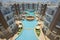 Swimming pool with bar in a luxury tropical hotel apartment resort