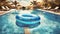 swimming pool with blue inflatable ring