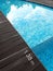 Swimming pool & dark wood deck, depth marking