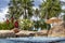 Swimming pool and jacuzzi inside surrounded by a tropical garden