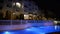Swimming pool at the luxury hotel in night illumination
