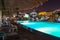 Swimming pool at luxury resort at night