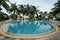 Swimming pool with many coconut trees in Nha Trang, Vietnam