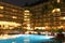 Swimming pool, night and palm