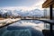 Swimming pool overlooking snow-capped mountains