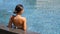 Swimming pool resort relaxation relaxing woman enjoying travel
