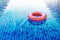 Swimming Pool Ring Float over Blue Water