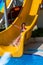 Swimming pool slides for woman on water slide at aquapark.