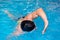 Swimming pool sport crawl swimmer. Man doing freestyle stroke technique in water pool lane training for competition.