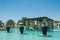 Swimming pool view with three jugs at the desert arabian resort