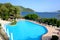 The swimming pool and view on yachts harbor