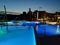 Swimming pools illuminated at night in a tourist complex on the Mediterranean coast