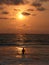 Swimming in the sea at sunset