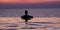 Swimming in sunset sunrise. Man swimming in infinity pool. Copy space banner. Hotel business, travel concept, travelling