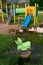 Swing-balancer on a spring on a playground after rain