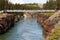 Swing bridge across Miles Canyon of Yukon River