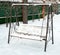 Swing covered in snow