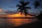 Swing or cradle hang on coconut tree shadow beautiful sunset at koh Mak Island beach Trad Thailand