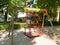 Swing for disabled person playground