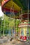 Swing rides in a children\'s park.