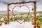 Swing in the shape of a heart in the valley of love in Cappadocia. Top view of a beautiful landscape