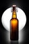 Swing top bottle of light beer isolated on black background