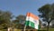 Swinging Tringa on the plastic flagpole in air. Indian Government Official flag swinging in the air with awesome tricolor and