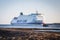 Swinoujscie, West Pomeranian - Poland - June 14, 2021: Ferry Polonia entering to port of Swinoujscie at sunrise. Transport