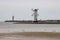 Swinoujscie, Zachodniopomorskie / Poland - August, 28, 2020: A windmill pond at the end of the breakwater. The symbol of the city