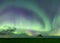 Swirl of Aurora Borealis Northern Lights over Historical School near Kyle, Saskatchewan, Canada