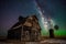 Swirl of bright northern lights over vintage barn, bins, windmill and stubble created with Generative AI technology