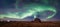 Swirl of bright Northern Lights over vintage barn in Saskatchewan, Canada