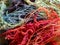 Swirl of colorful cotton fabric strands