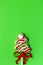 Swirled Christmas tree on green background