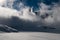 Swirling clouds surrounding the mountain tops in Switzerland