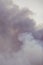 Swirling smoke from a large fire, similar to clouds